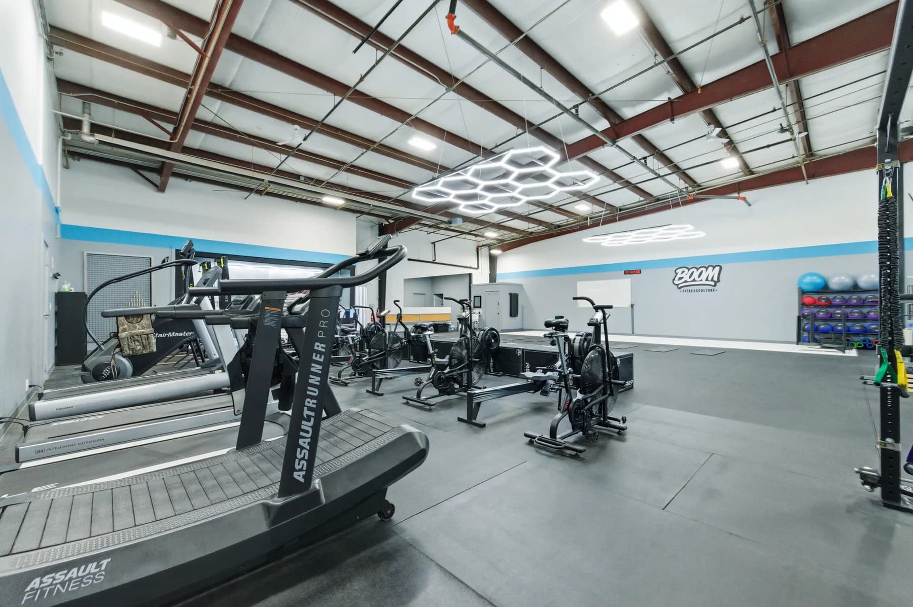 Strength and conditioning equipment inside Boom Fitness Culture