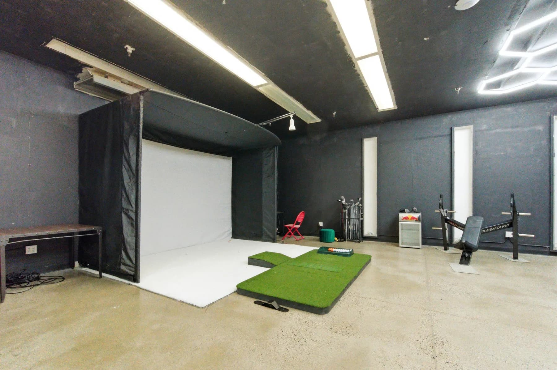 Golf simulator and content studio inside The Anata Building